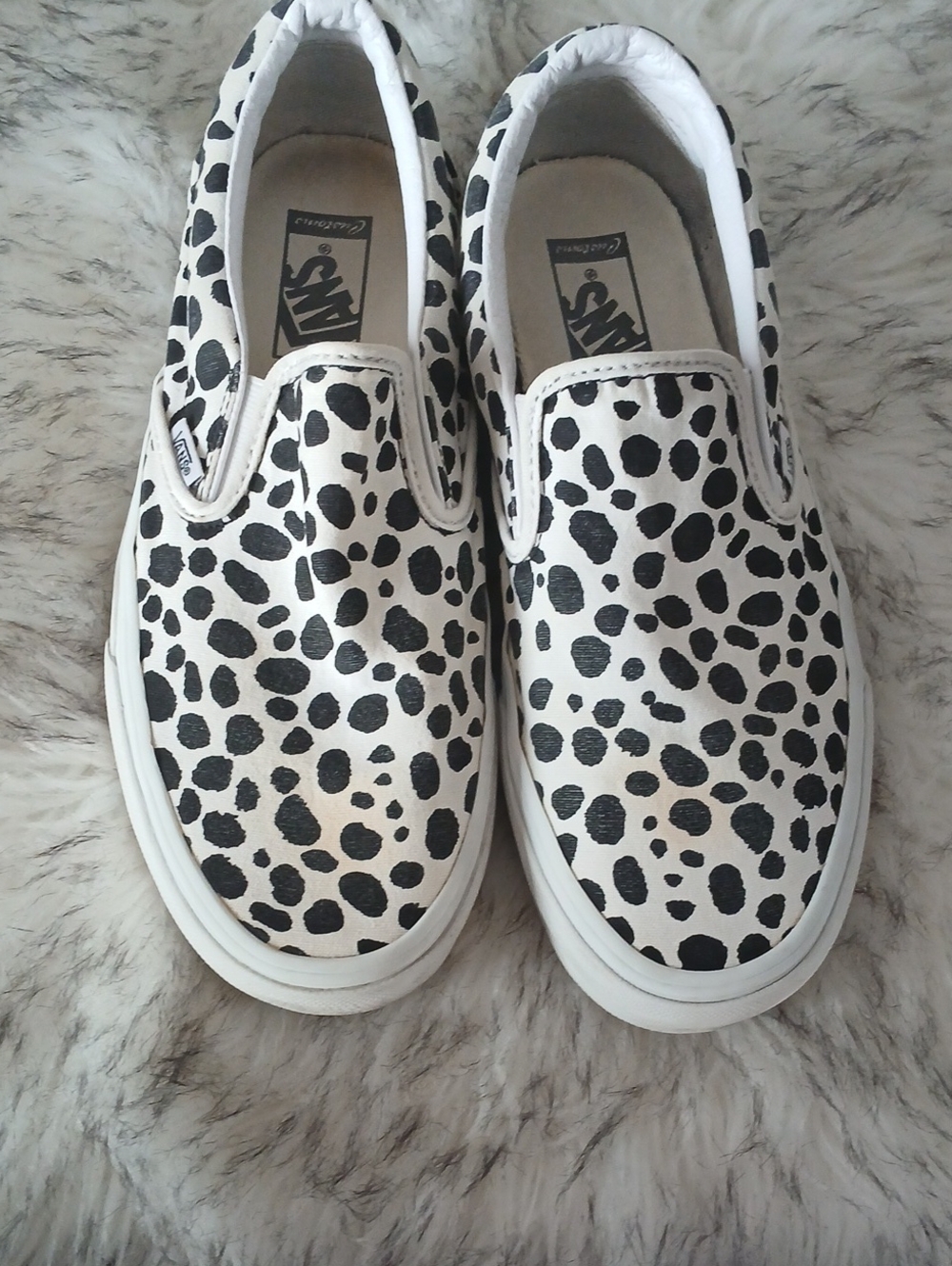 Vans Slip-On Sneakers in White with Black Spot Print